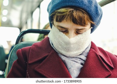 Saint-Peterburg, Russia -30.04.2020. Woman Are Sitting In The Bus With Self Made Mask During Pandemic Time.