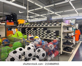 Saint-Petersburg, Russia, 03.01.2021 Sports Goods On The Shelf Of A Sports Store In Russia. Soccer Balls And Other Sports Items