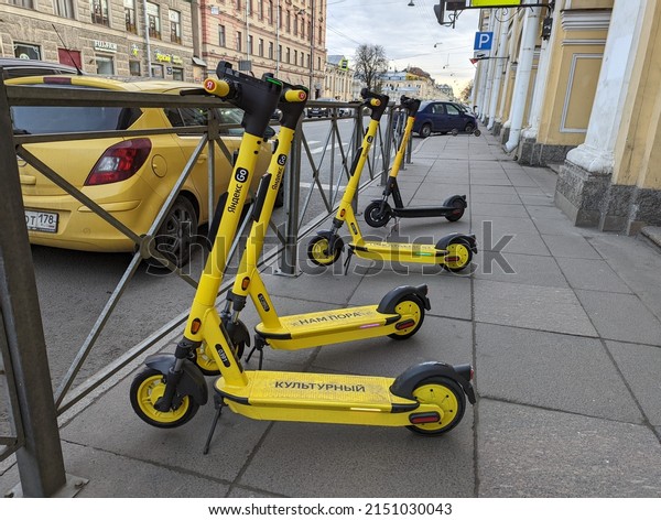 Saint-Petersburg,\
Russia - 04.29.2022. Yandex go scooter (яндекс го) yellow kick\
scooter by yandex drive. New service. Car sharing or kick scooter\
sharing in Moscow and Saint-Petersburg\
