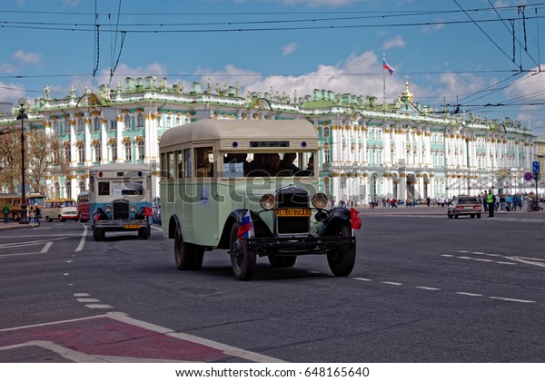 SAINT-PETERSBURG, RUSSIA - 21 MAY\
2017: Historical Soviet bus. Parade of vintage cars. Tinted\
photo.