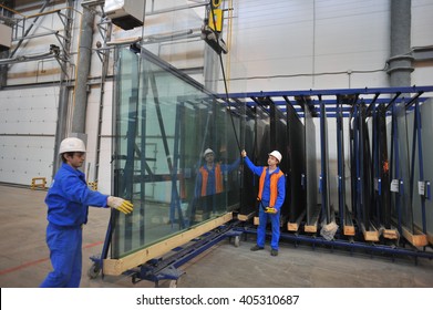 Saint-Petersburg, Russia - 4 February 2010: The Float Glass Production Plant. Working Professionals Monitor The Manufacturing Process And Product Quality.