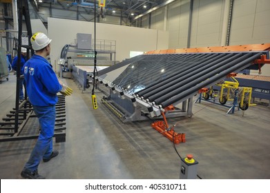 Saint-Petersburg, Russia - 4 February 2010: The Float Glass Production Plant. Working Professionals Monitor The Manufacturing Process And Product Quality.