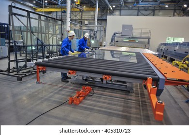 Saint-Petersburg, Russia - 4 February 2010: The Float Glass Production Plant. Working Professionals Monitor The Manufacturing Process And Product Quality.