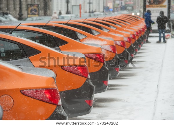 Saint-Petersburg, Russia - January 30, 2017:\
cars-sharing - the opening of a new service car rental per minute.\
Several parked rental\
car