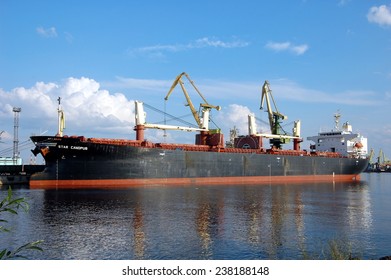 SAINT-PETERSBURG, RUSSIA, JULY 14, 2013: Cargo Ship Star Canopus In Cargo Sea Port In St. Petersburg