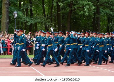 SAINT-PETERSBURG, RUSSIA - JUNE 21 2019: Students Of A Military Academy Graduation Ceremony , Throwing Coins In Air