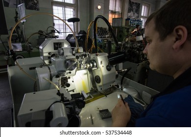 Saint-Petersburg, Russia - November 10, 2016: Machine Shop For The Production Of Gears And Other Small Parts For Mechanical Watches. Specialist Watchmaker At Work.