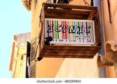 SAINT-TROPEZ, PROVENCE, FRANCE - AUGUST 21, 2016: Unusual Barcode Sign In An Old Box, For The ICONIC FAMILY STORE In St Tropez