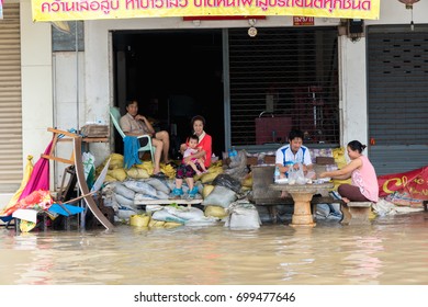 SAKON NAKHON, THAILAND - JULY 30, 2017 :People waiting for help The big flood in Sakon Nakhon after tropical storm SONCA