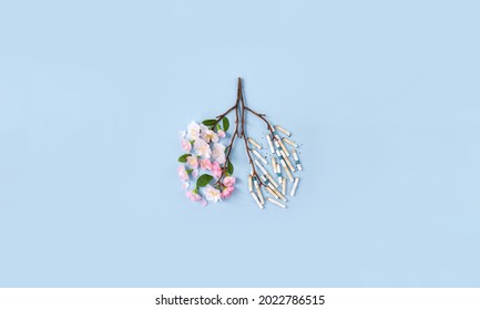 Sakura flowers and cigarette sticks in the form of human lungs. World No Tobacco Day. No smoking. Medical banner, copy space