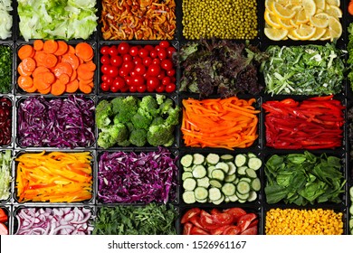 Salad Bar With Different Fresh Ingredients As Background, Top View