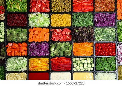 Salad Bar With Different Fresh Ingredients As Background, Top View