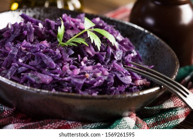 Salad Of Boiled Red Cabbage In A Dark Bowl.