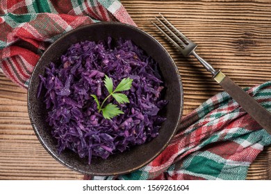 Salad Of Boiled Red Cabbage In A Dark Bowl.