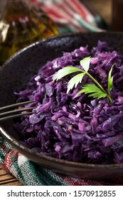 Salad Of Boiled Red Cabbage In A Dark Bowl.