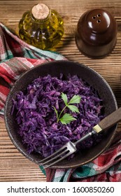 Salad Of Boiled Red Cabbage In A Dark Bowl.