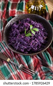 Salad Of Boiled Red Cabbage In A Dark Bowl.