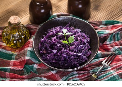 Salad Of Boiled Red Cabbage In A Dark Bowl.