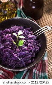 Salad Of Boiled Red Cabbage In A Dark Bowl.