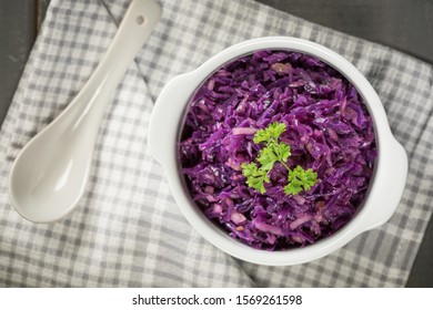 Salad Of Boiled Red Cabbage In A White Bowl.