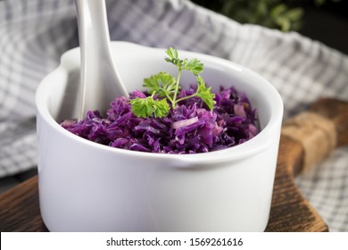 Salad Of Boiled Red Cabbage In A White Bowl.