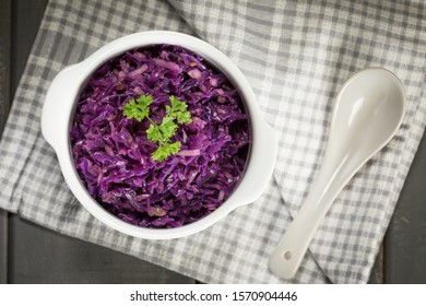 Salad Of Boiled Red Cabbage In A White Bowl.