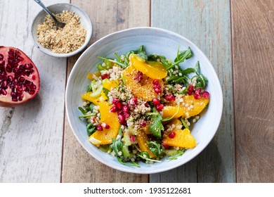 Salad with buckwheat, orange and pomegranate seeds