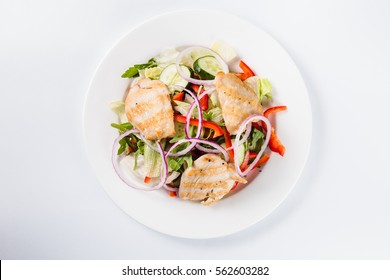 Salad With Chicken On A White Plate On A Light Background (close Top View)