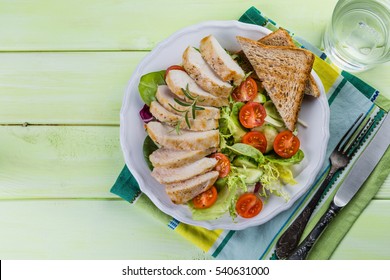 Salad With Chicken Steak On White Plate, Top View