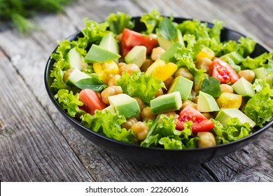 Salad With Chickpeas, Tomato And Avocado