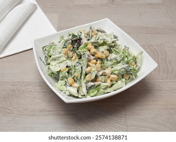 salad with corn, salad with cabbage, salad on the table, white salad bowl 