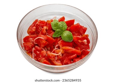 Salad of cut raw tomatoes with onion slices dressed with olive oil and basil leaves in glass bowl isolated on white, clipping path included - Shutterstock ID 2365284935