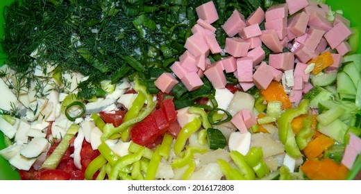 Salad Ingredients. Finely Chopped Vegetables And Herbs Lie In A Bowl.