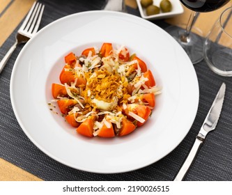 Salad Made Of Tomato And Deviled Egg Scattered With Grated Cheese And Served On Plate.