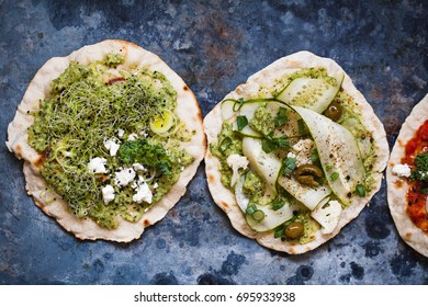 Salad On Flatbread And Pizza With Guacamole Sauce Cucumber Olive Fresh Feta Veggie Flatbread Pizza Soybean Sprouts
