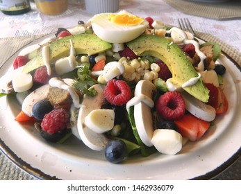 salad on a white plate 			