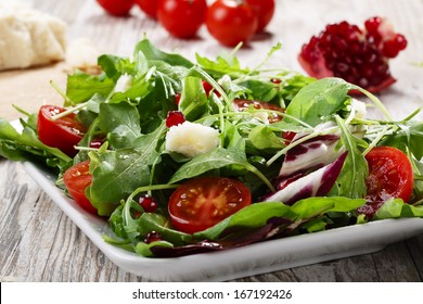 Salad With Parmesan Cheese And Pomegranate