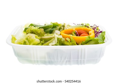 Salad In Plastic Container Isolated On White Background