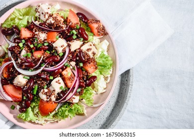 Salad With Quinoa, Chicken, Tomatoes, Beans And Onions.