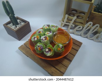 Salad With Rice Paper Wraps And Sweet And Sour Sauce