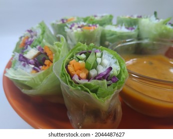 Salad With Rice Paper Wraps And Sweet And Sour Sauce