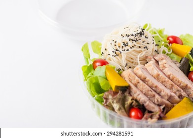 Salad with roasted pork and soba noodles by clean food concept in lunch box - Shutterstock ID 294281591