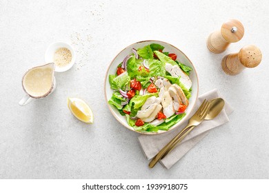 Salad With Romaine Lettuce, Grilled Chicken Meat And Tomatoes