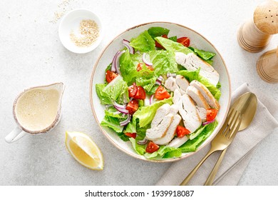 Salad With Romaine Lettuce, Grilled Chicken Meat And Tomatoes