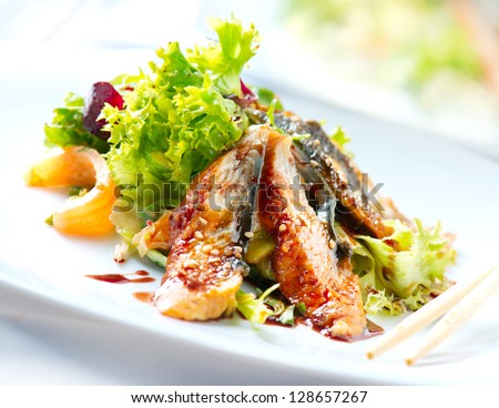 Salad With Smoked Eel with Unagi Sauce. Japanese Food