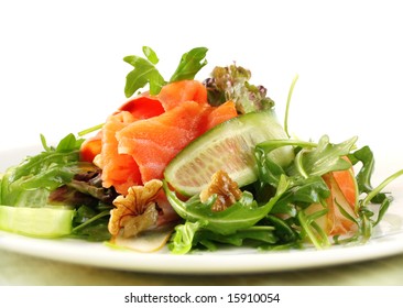 Salad With Smoked Salmon, Walnuts, Pears, Cucumber And Rocket.