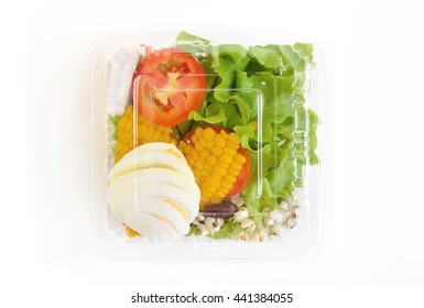 Salad In Takeaway Container From Top On White Background