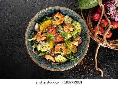 Salad With Tiger Prawns, Avocado And Orange. Cold Veggie Appetizer With Arugula, Seafood, Radish, Avocado, Citrus, Onion, Cucumber And Salad Dressing.