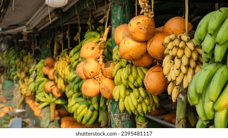 Salalalah, Oman -November 11.2023 : Fruit for sale in fruit stalls at Sultan Qaboos Street in salalah, oman, Dhofar Governorate - Shutterstock ID 2395481117