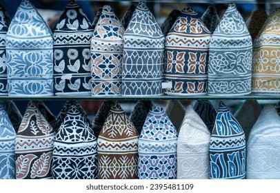 Salalalah, Oman -November 11.2023 : traditional men cap for sale at store in salalah, oman, Dhofar Governorate - Shutterstock ID 2395481109